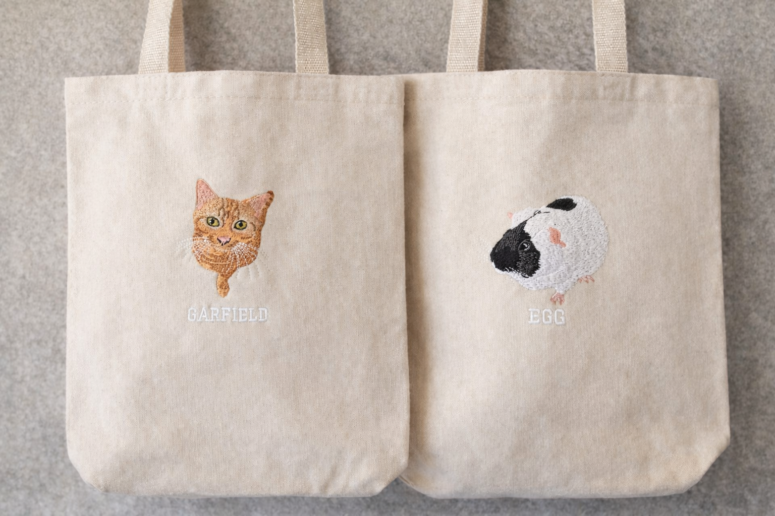 Personalised embroidered pet tote bags with cat and guinea pig designs from Ineedledit