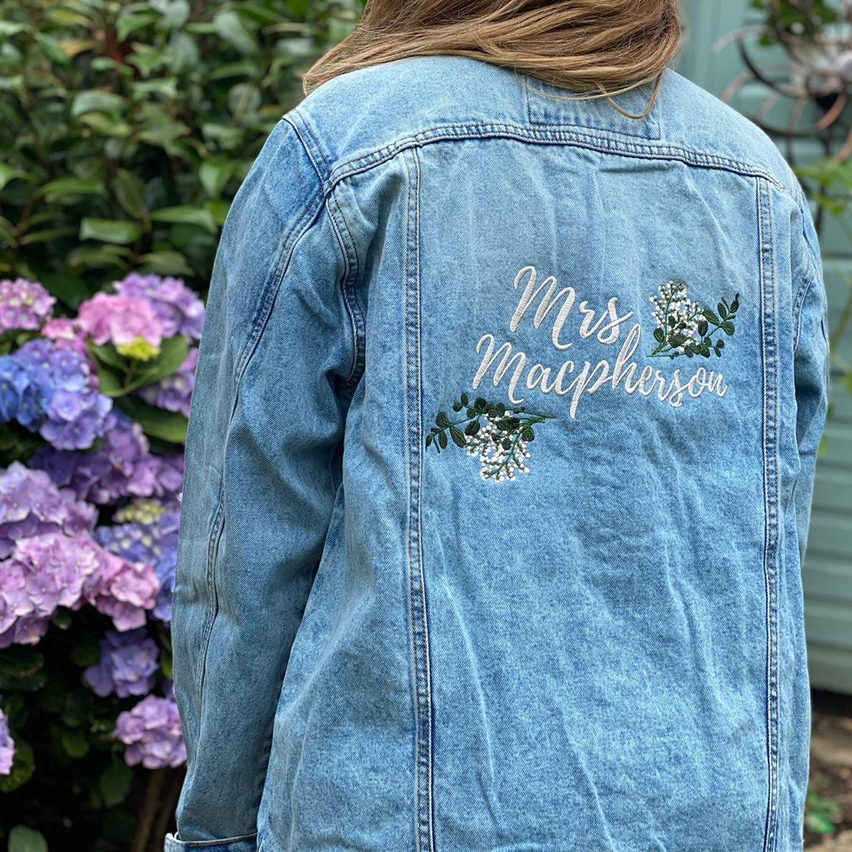 Personalised embroidered denim jacket with 'Mrs Macpherson' and floral design by Ineedledit