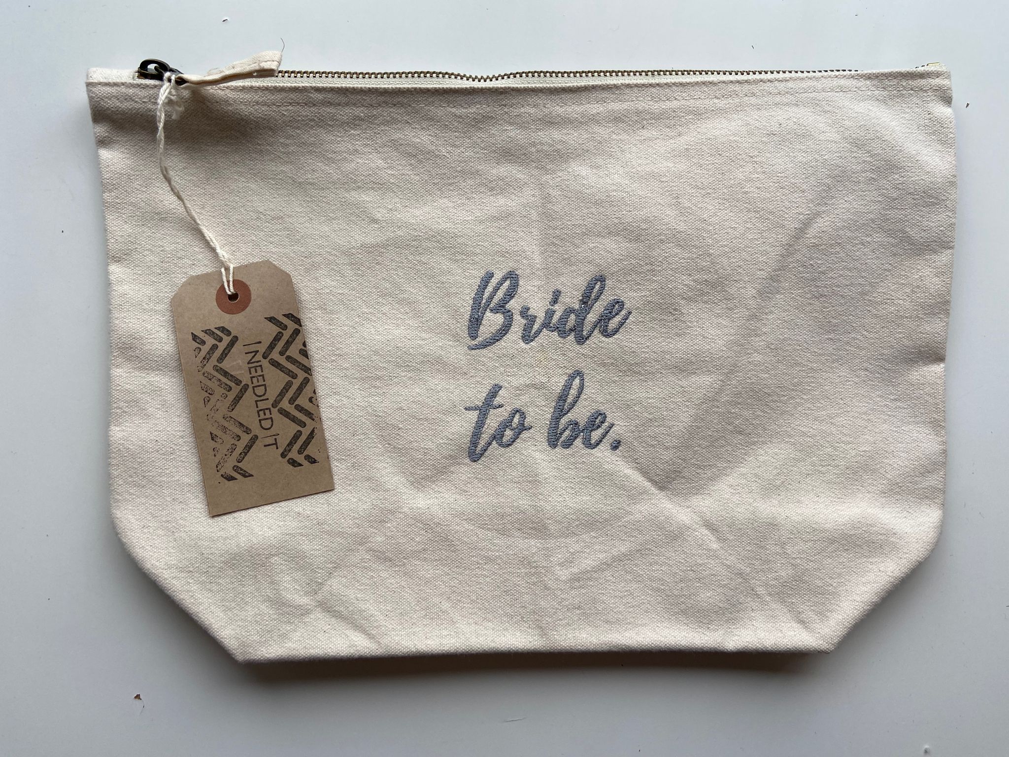 Personalised embroidered canvas pouch with 'Bride to be' text and Ineedledit tag, perfect for gifting