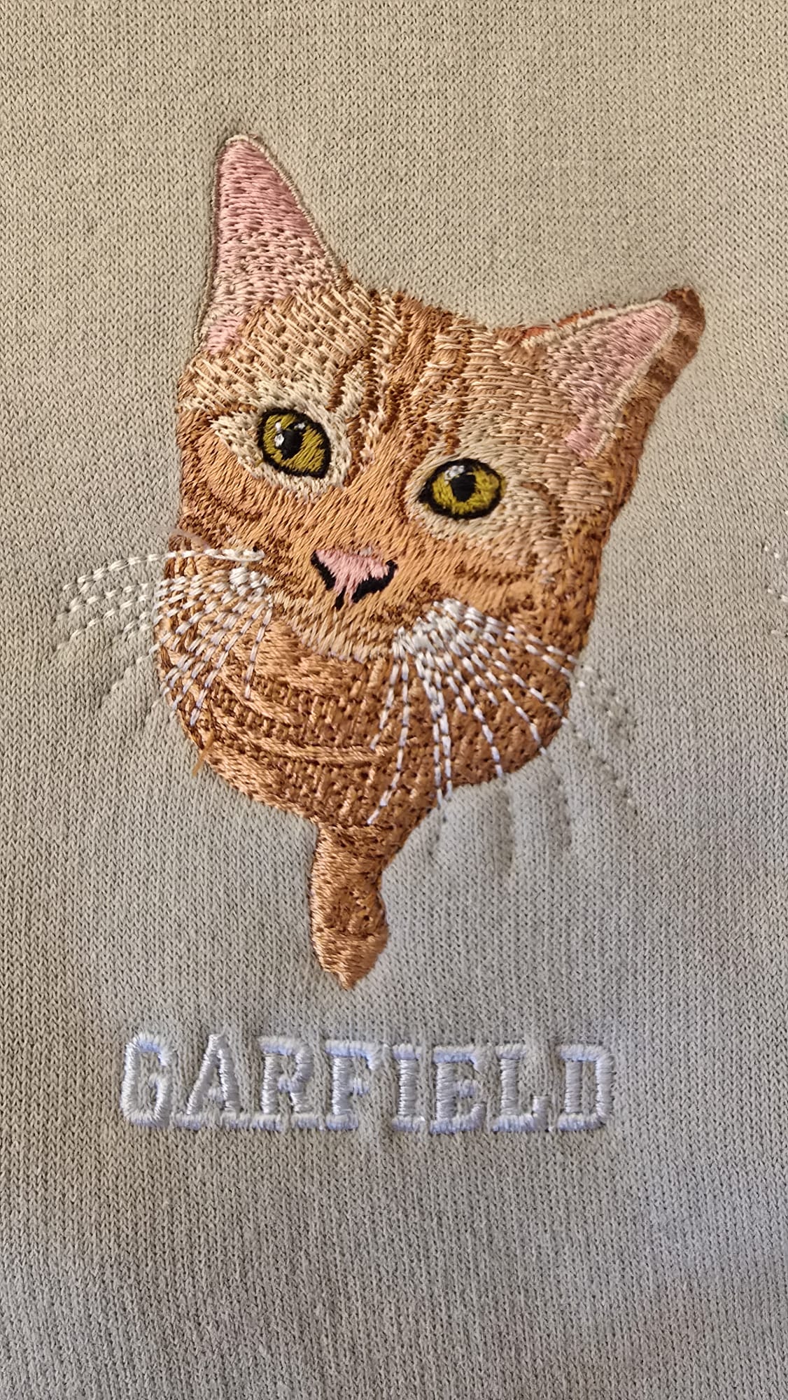 Personalised embroidered orange tabby cat face with Garfield name, custom pet embroidery gift